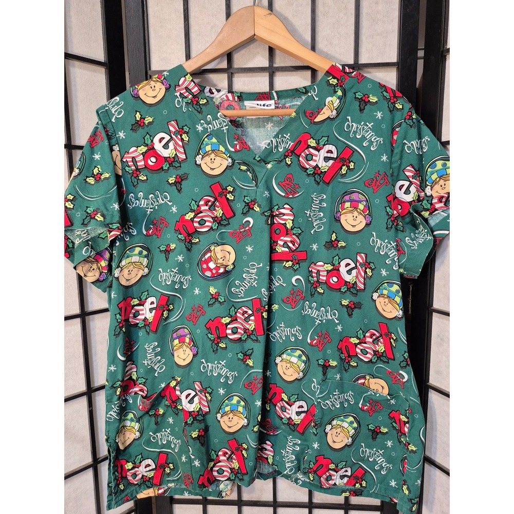 Scrub Life Christmas Noel Holiday V-Neck Scrub Top Green Short Sleeve Pockets